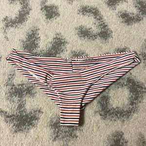 Frankie’s cheeky red and blue striped bikini bottoms